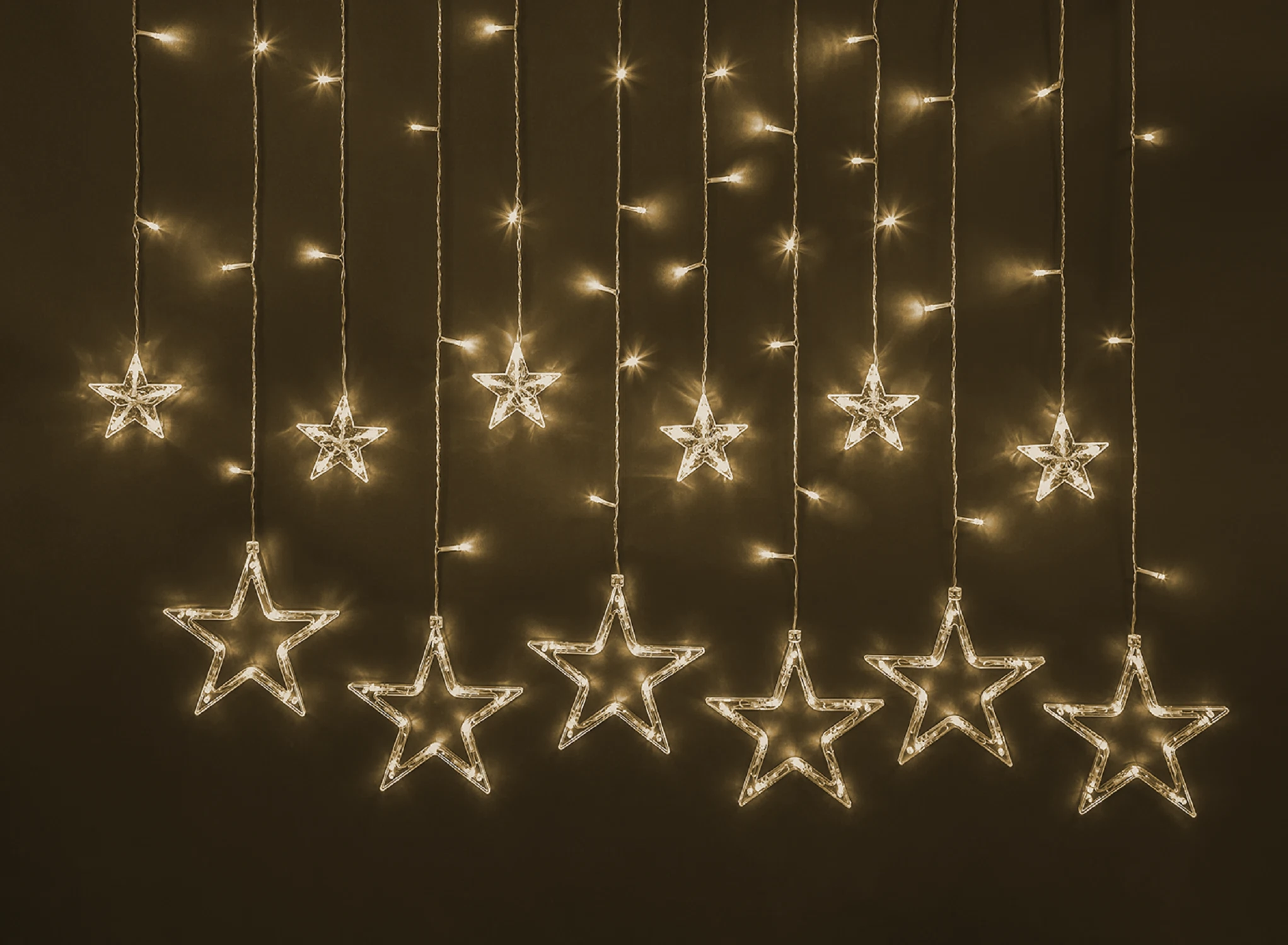 Изображение товара Гирлянда Navigator 93 679, звезды, бахрома 2.5*0.6 м, теплый свет, для интерьера, IP20